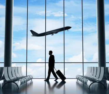 Professional Chauffeur greeting customer for Pearson Airport transfer